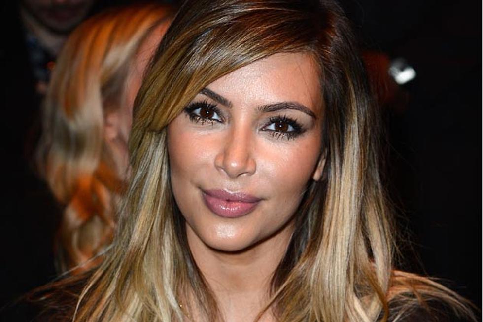 Kim Kardashian Flaunts Sideboob + Booty in White Bikini [PHOTO]