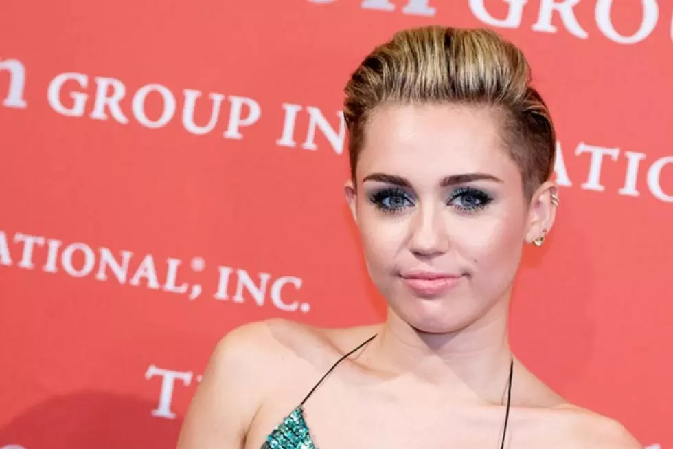 Miley Cyrus Dons Lil Kim Costume for Halloween, Celebrates With Porno Pumpkins [NSFW]