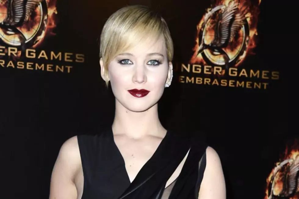 Jennifer Lawrence Vamps It Up, Flashes Sideboob in Dior at Paris &#8216;Catching Fire&#8217; Premiere [PHOTOS]