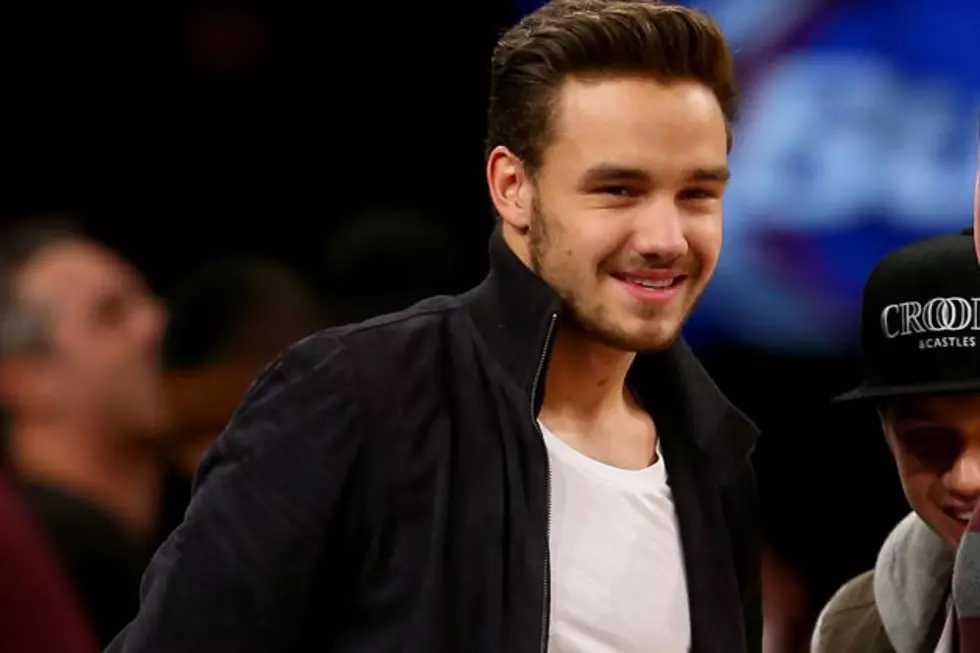 One Direction’s Liam Payne Gets Cozy With a Really Big Snake [PHOTOS]