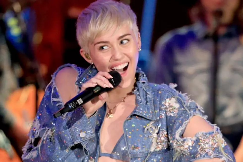 Miley Cyrus Gets Lip Tattoo [PHOTOS]