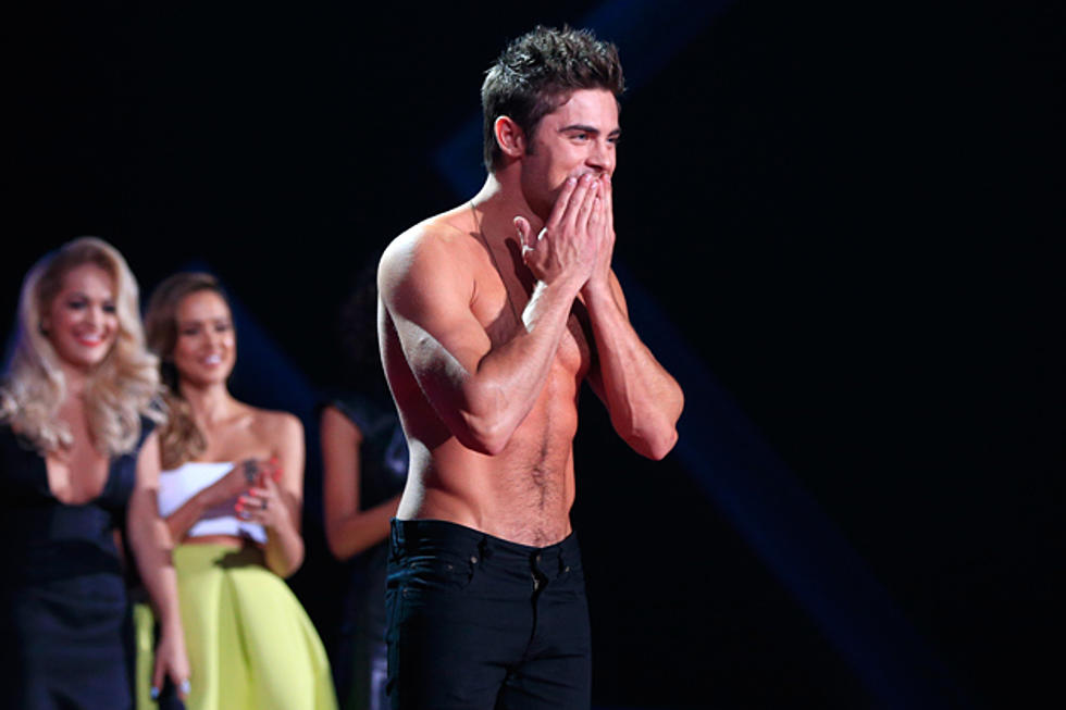 Zac Efron Goes Shirtless + Kisses Fan at 2014 MTV Movie Awards [PHOTOS]