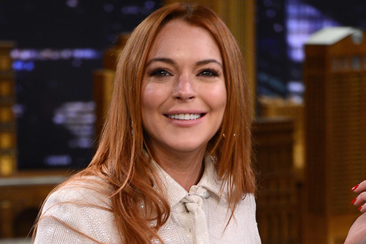Lindsay Lohan Shares Topless Selfie While Vacationing
