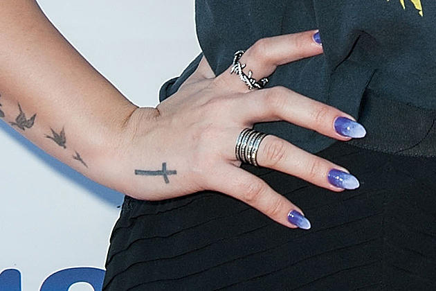 Demi Lovato vs. Harry Styles: Whose Hand Tattoo Is Best?