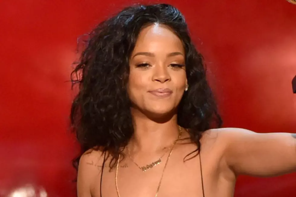 Rihanna Poses for Topless Photo While Holding Baby Niece [NSFW PHOTOS]