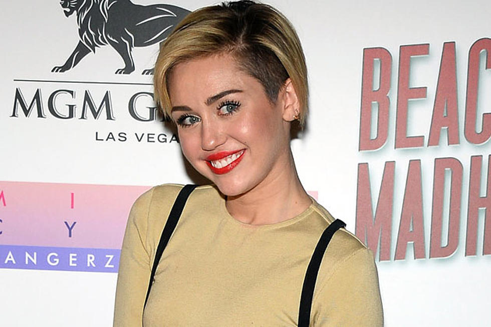 Miley Cyrus Goes Camping, Brings Models, Fast Food + Moonshine [PHOTOS]