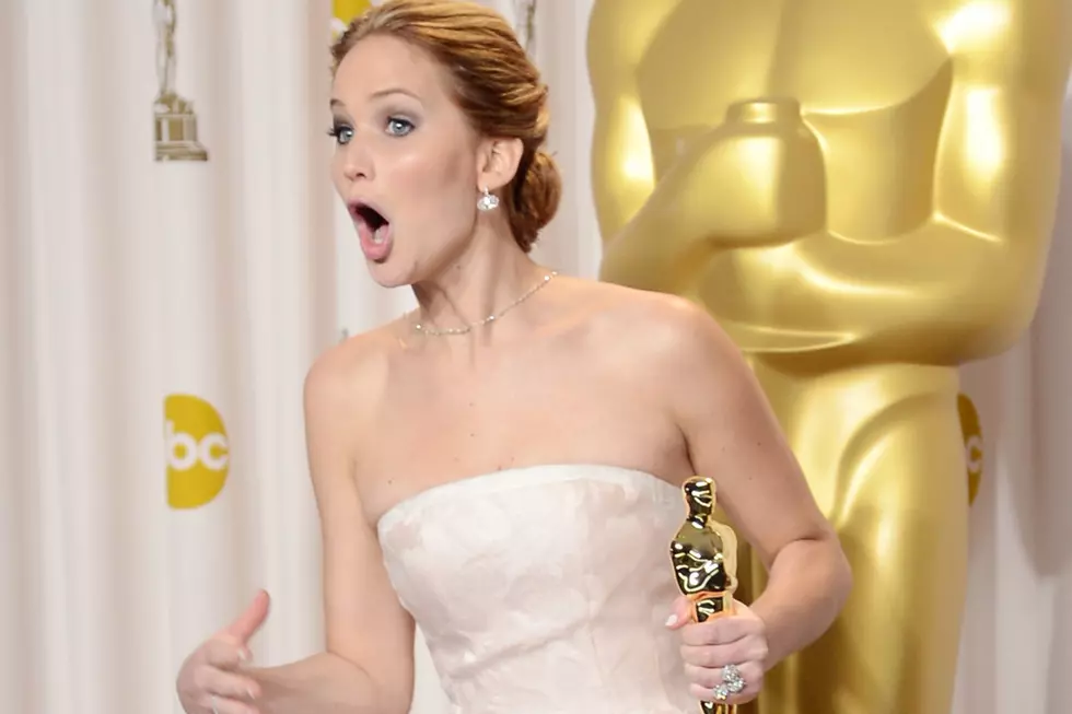 Jennifer Lawrence Runs After Fans Knock Down Barricade [VIDEO]