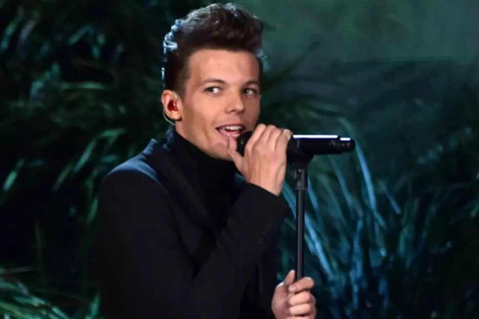 Louis Tomlinson Slams Hater for Making Fun of His Laugh
