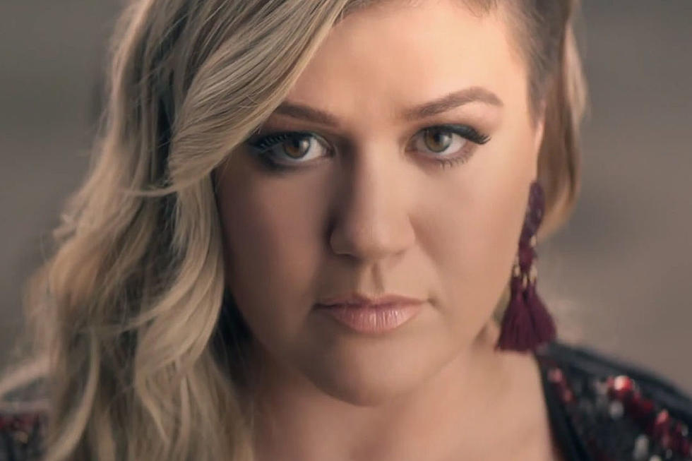 Kelly Clarkson Breaks You Out of Your Light-Up Box In ‘Invincible’ Video