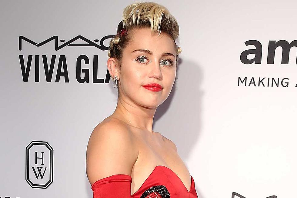 Miley Cyrus Sports Long Hair, Bangs for MAC Viva Glam Ad