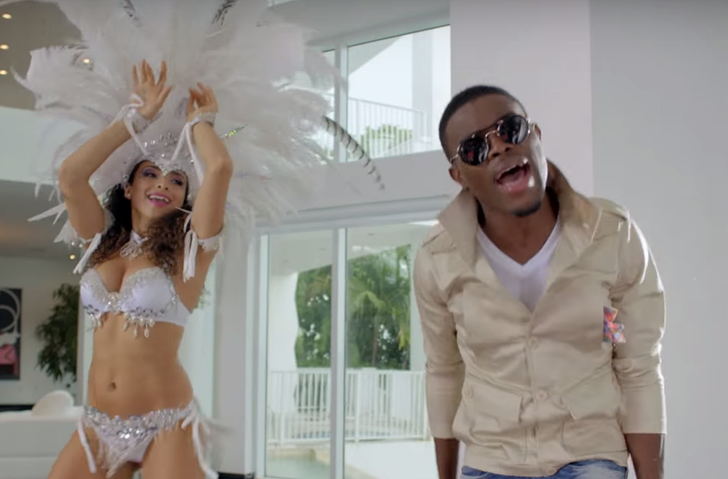 OMI's 'Hula Hoop' Video Busts Out the Carnival Costumes