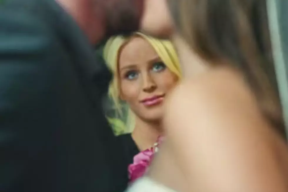 Gigi Gorgeous Is a Forlorn Officiant in Adam Lambert’s ‘Another Lonely Night’ Video