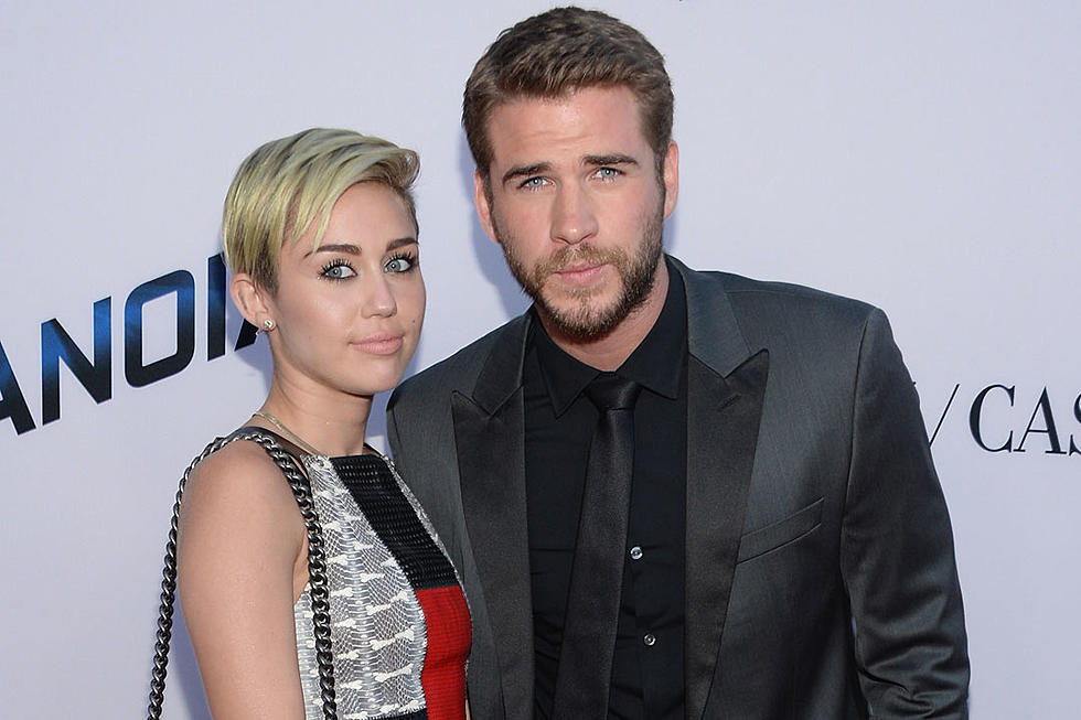 Miley Cyrus + Liam Hemsworth Are Reportedly Engaged Again