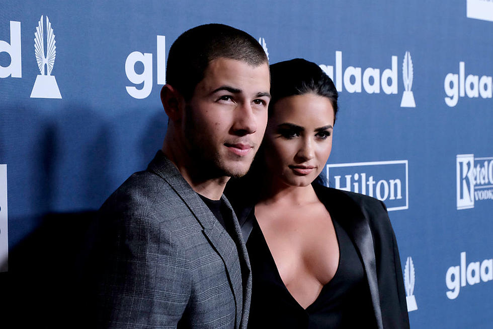 Demi Lovato + Nick Jonas Paint Boston Red, White + Blue With 4th of July Performance