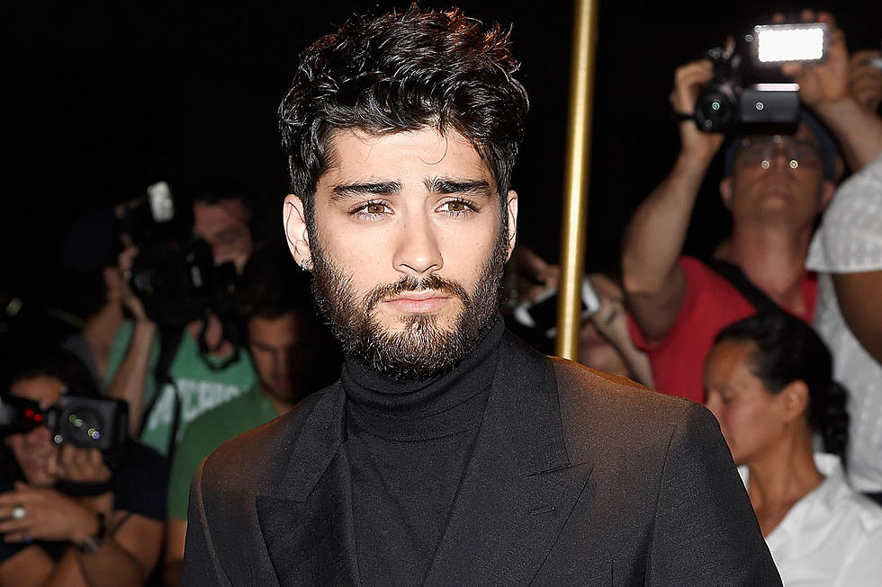 Zayn Has A Wall Covered in One Direction Memorabilia Just Like the Rest of Us