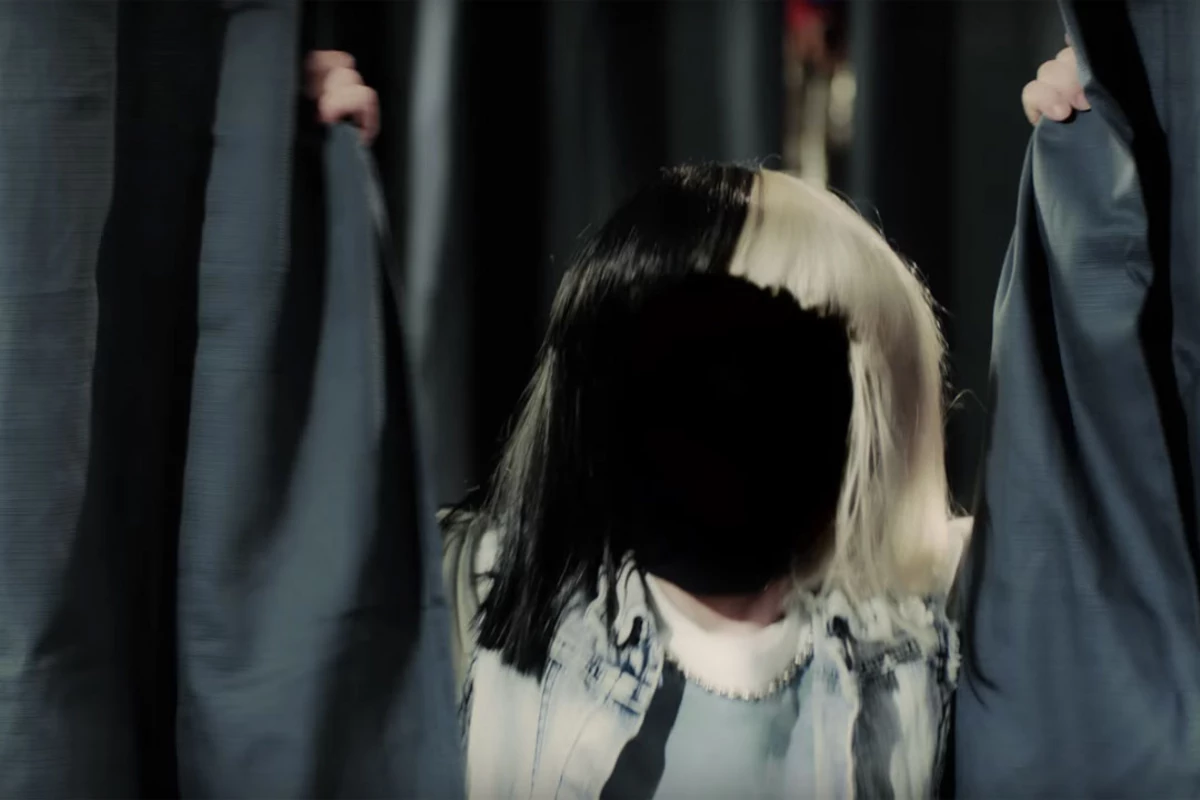 Sia's 'Move Your Body' Video Explores The Origin Story of Her Two-Toned Wig