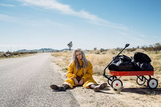 Billie Eilish Is On the Run in &#8216;Bellyache': Watch