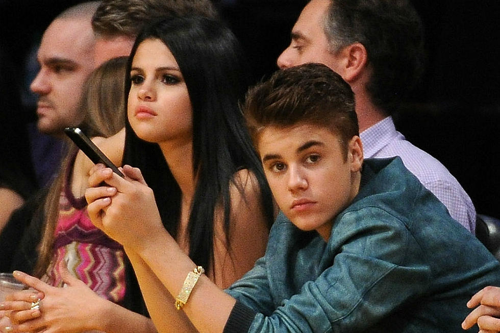 Justin Bieber + Selena Gomez Spotted Kissing at Hockey Game