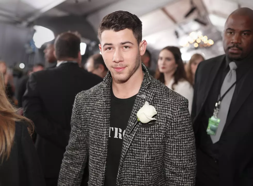 Nick Jonas Spotted Kissing Mystery Woman