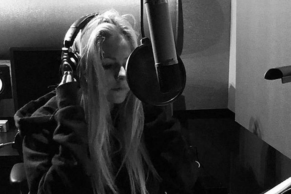 Avril Lavigne Shares Photo from Studio Vocal Session, Hints at New Music