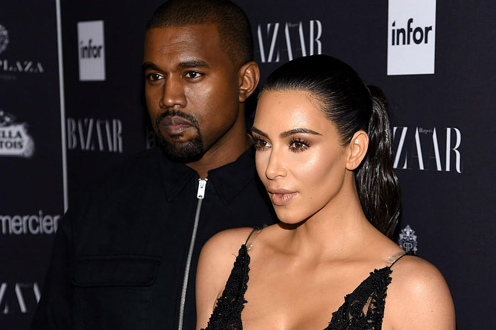 Kim Kardashian Details Struggle of Taking First Full-Family Photo