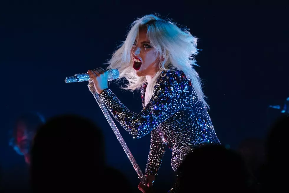 Lady Gaga and Fan Fall Off Stage During Concert: Watch