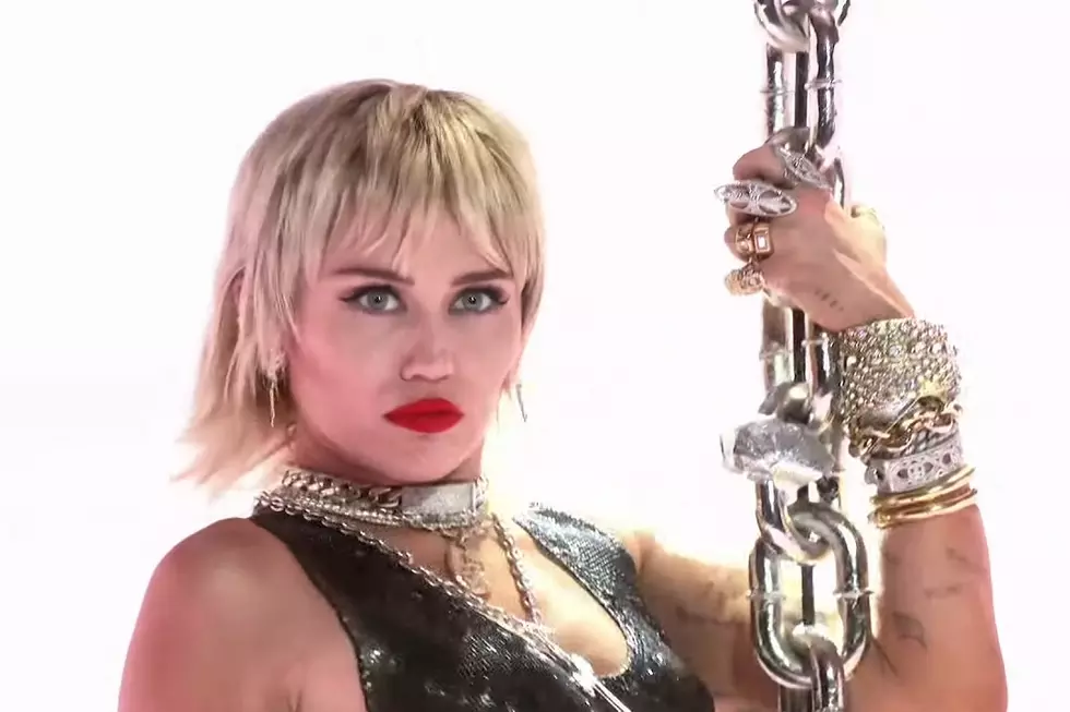 Miley Cyrus Swings on Giant Disco Ball During ‘Midnight Sky’ VMAs Performance: WATCH