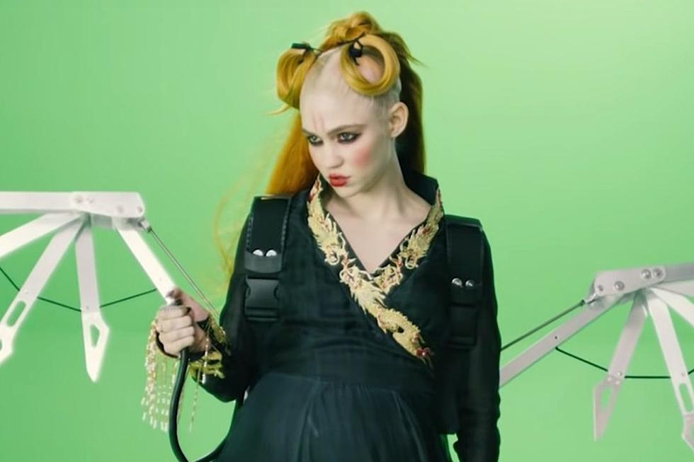 Grimes Fans Confused After Singer Posts Bizarre Video About Communism and A.I.