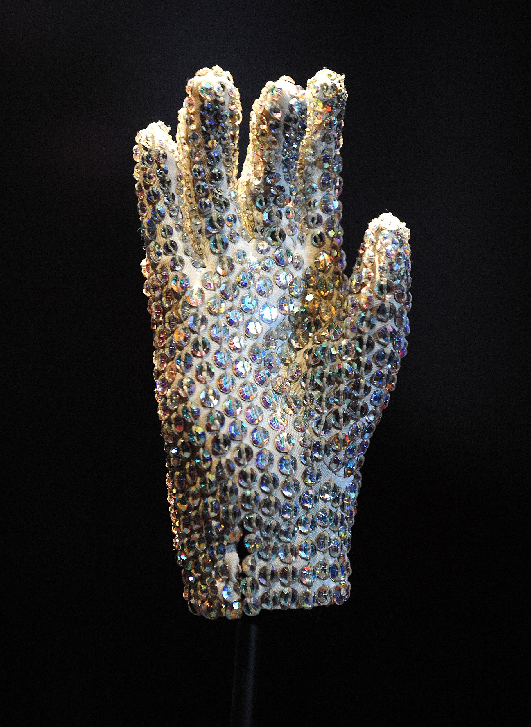 Lot Detail - Michael Jackson's Famous Crystal-Encrusted Glove -- Worn by  the King of Pop at the 1984 American Music Awards Honoring His Achievements  on ''Thriller'' -- With Autograph Book Signed Four Times