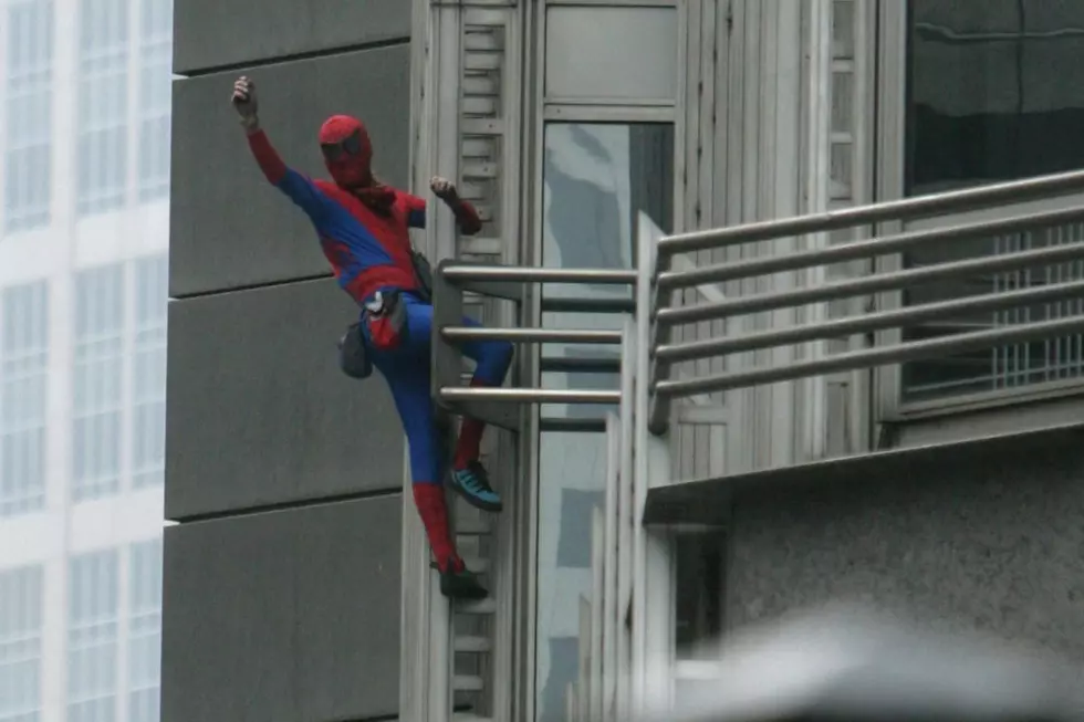 60-Year-Old &#8216;French Spider-Man&#8217; Climbs Paris Skyscraper Using Bare Hands