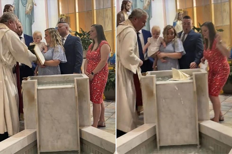 OMG, Literally! Baby Smacks Bible Into Holy Water During Baptism: WATCH
