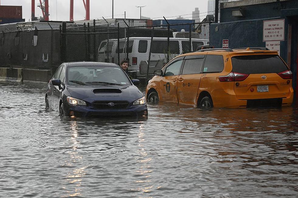 A Surreal Look at the Torrential Rain Flooding in New York City (PHOTOS & VIDEOS)