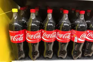 Difference Between the Red Cap and the Yellow Cap on Coca-Cola...