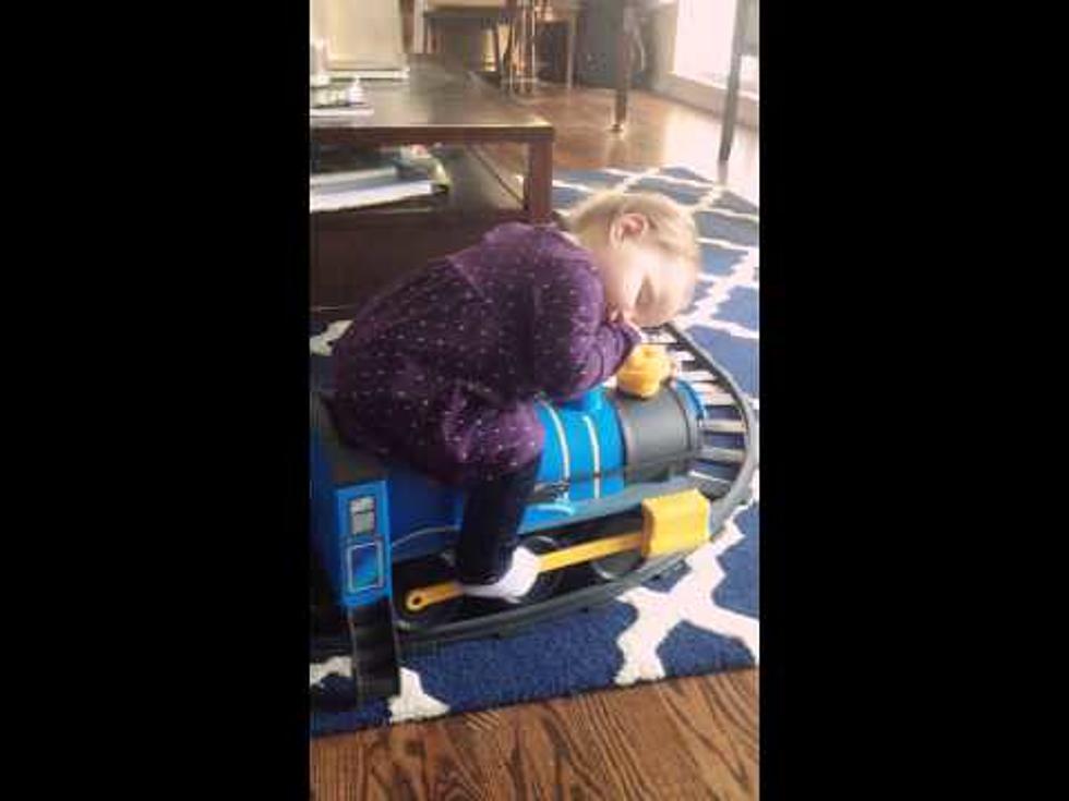 Little Girl Sleeps On Toy Train [VIDEO]