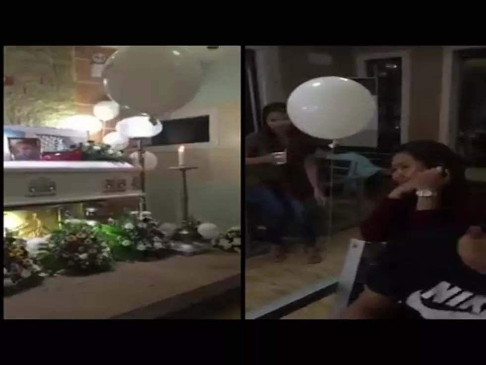 White Balloon Floats To Grieving Mother At Child’s Funeral