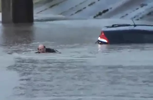 Houston Weatherman Rescues Stranded Driver On Live TV [Video]