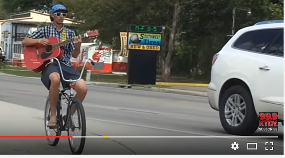 Guitar/Bicyclist On Pinhook