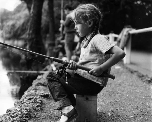 Boy Sitting in Chair and Fishing Amongst the Reeds Stock Image - Image of  reed, concentration: 54834163