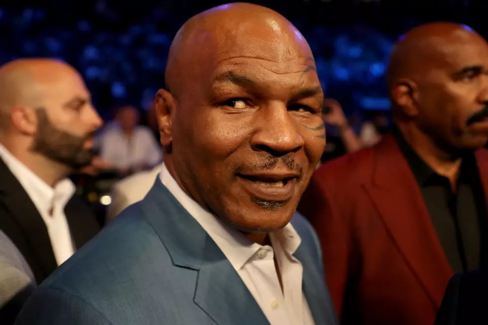 Mike Tyson Sneaks Up on People Answering Questions About Mike Tyson [Video]