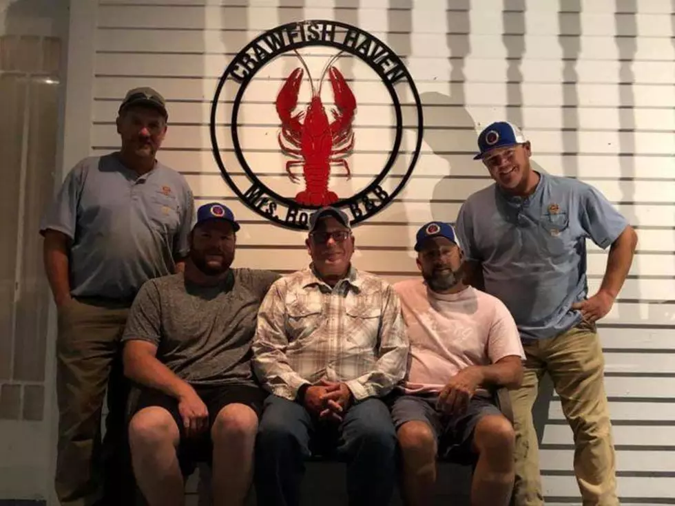 Local Businessman Hosts Linemen from Georgia