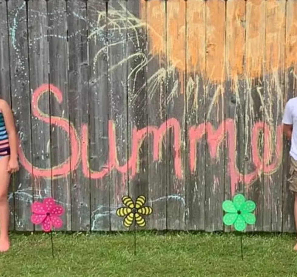 Youngsville Family Decorates Fence for Summer