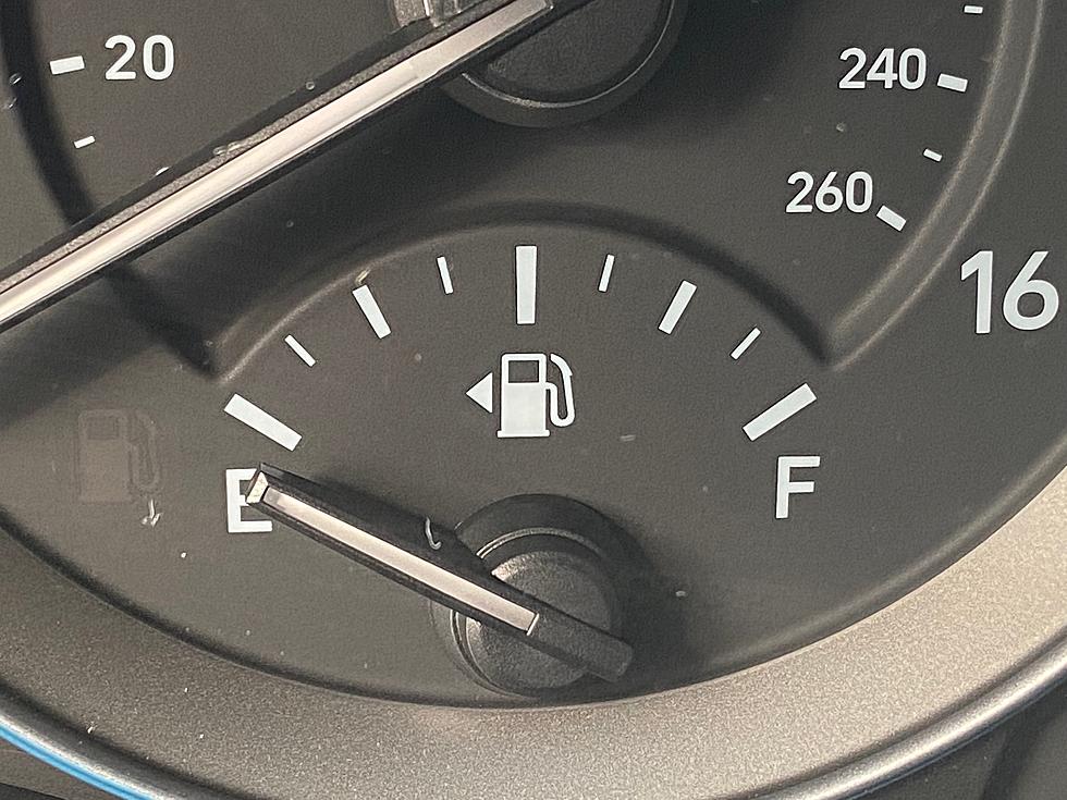 What Does the Tiny Arrow Next to the Gas Gauge Symbol on Your Dashboard Mean