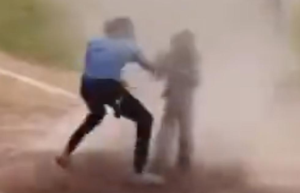 Dramatic Video Shows an Umpire Saving a Kid Caught in ‘Dustnado’
