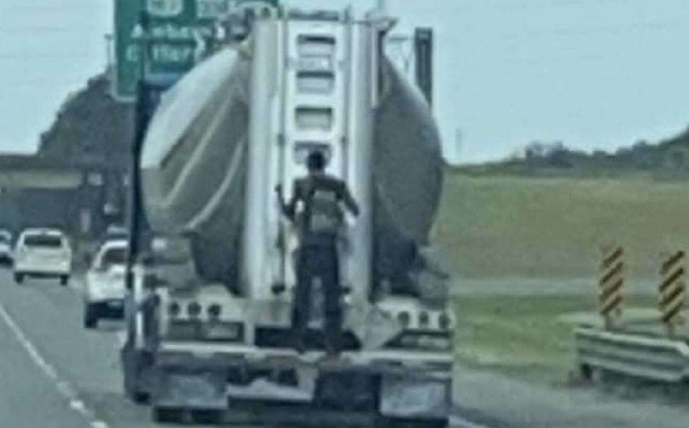 Man Seen Riding on Back of Truck on I-10 in Lafayette [VIDEO]