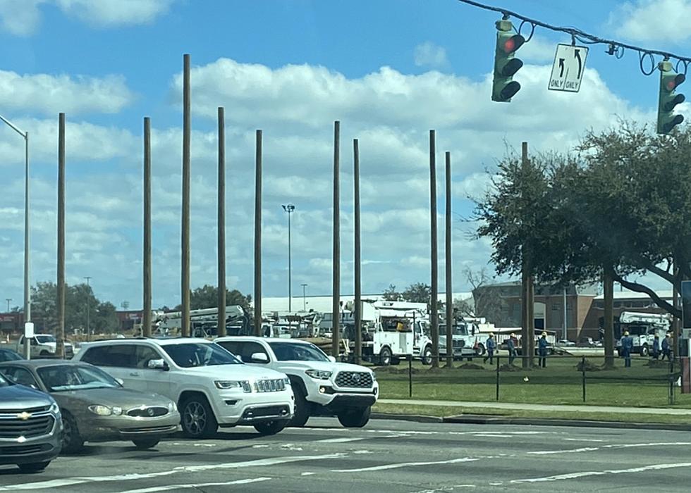 LUS Crews Erect Several Power Poles Near Busy Intersection in Lafayette, Louisiana