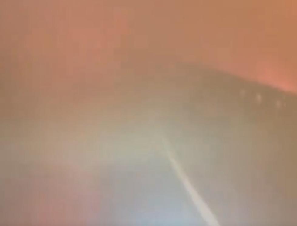 Watch Shocking Video of Officials Driving Through Texas Wildfire