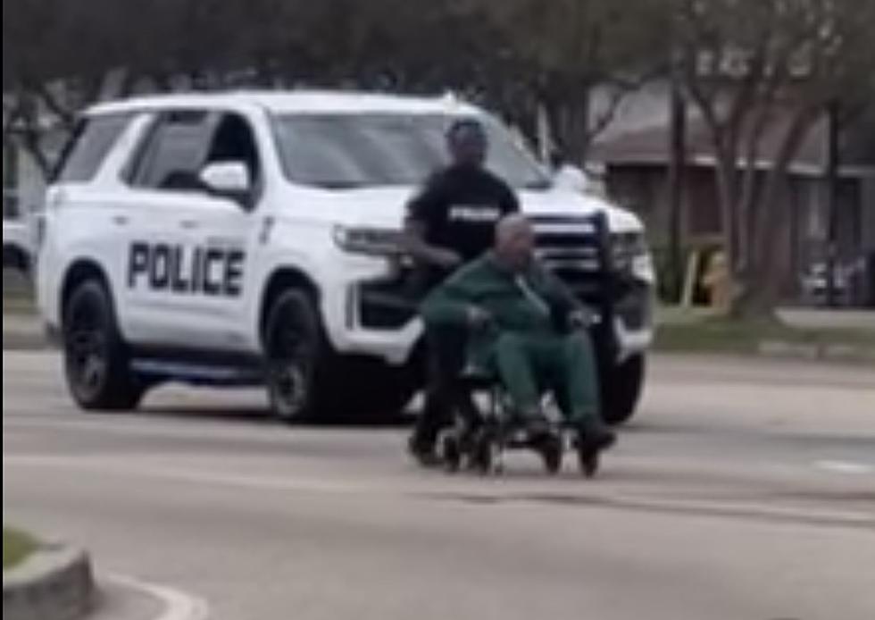 Baton Rouge Police Officers Seen Assisting Person in Wheelchair on Busy Road