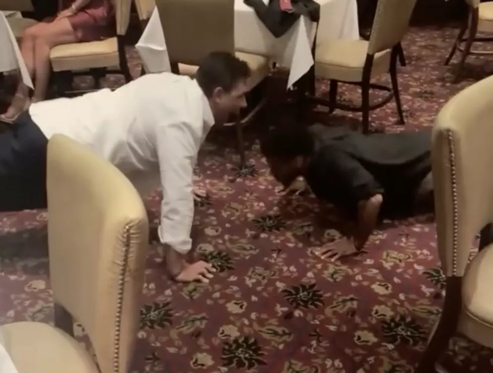 Patron Challenges Server to Pushup Contest in Lafayette, Louisiana Steak House