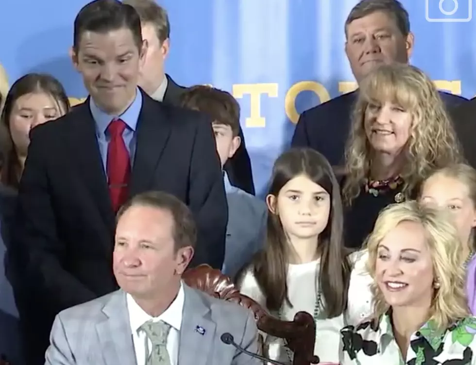 Young Girl Faints As Louisiana Governor Signs New Bill Into Law