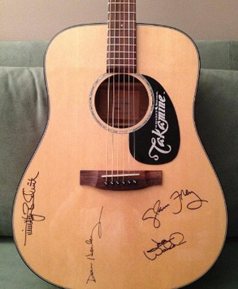 Eagles Contribute Autographed Guitar to Newtown Auction
